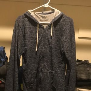 Navy blue zip-down jacket with a hoodie